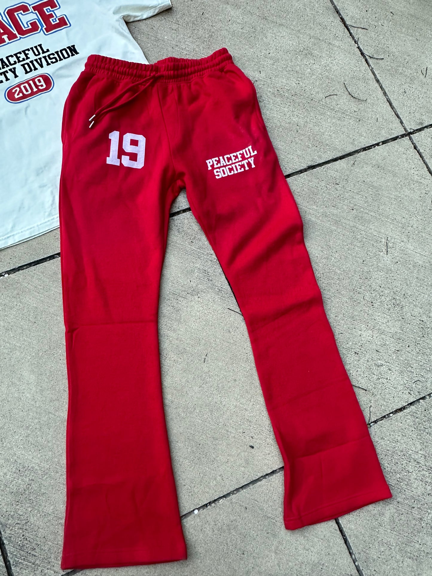 Red ‘Peaceful Society 19’ Stacked Sweats