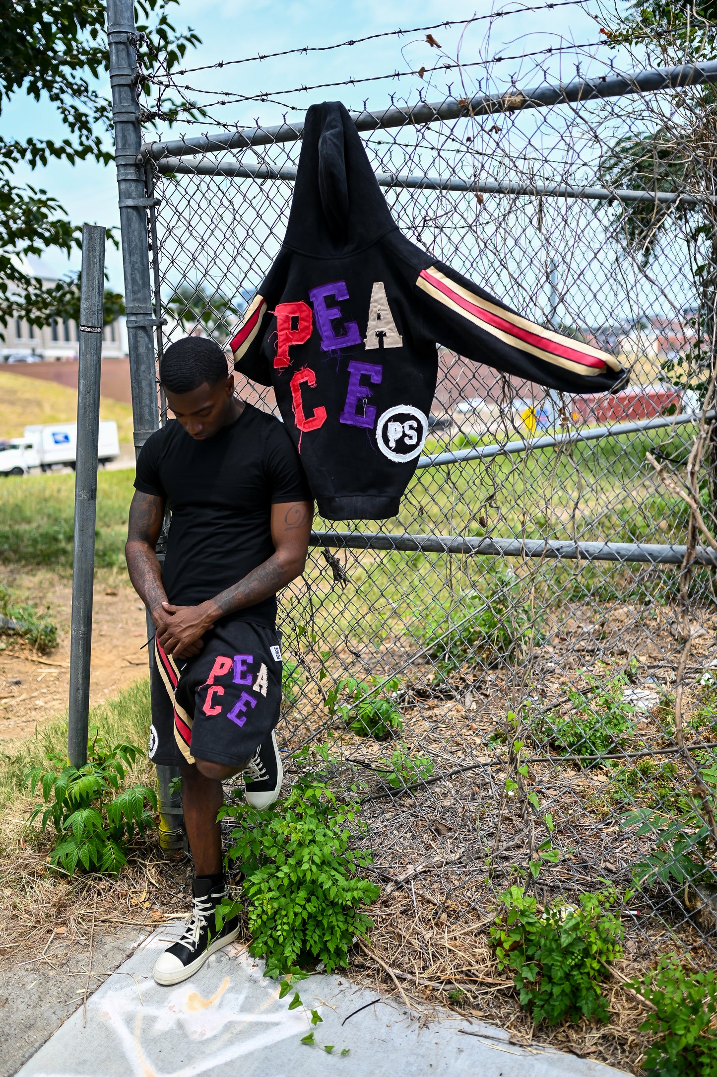 Black ‘Peace’ Striped Shorts