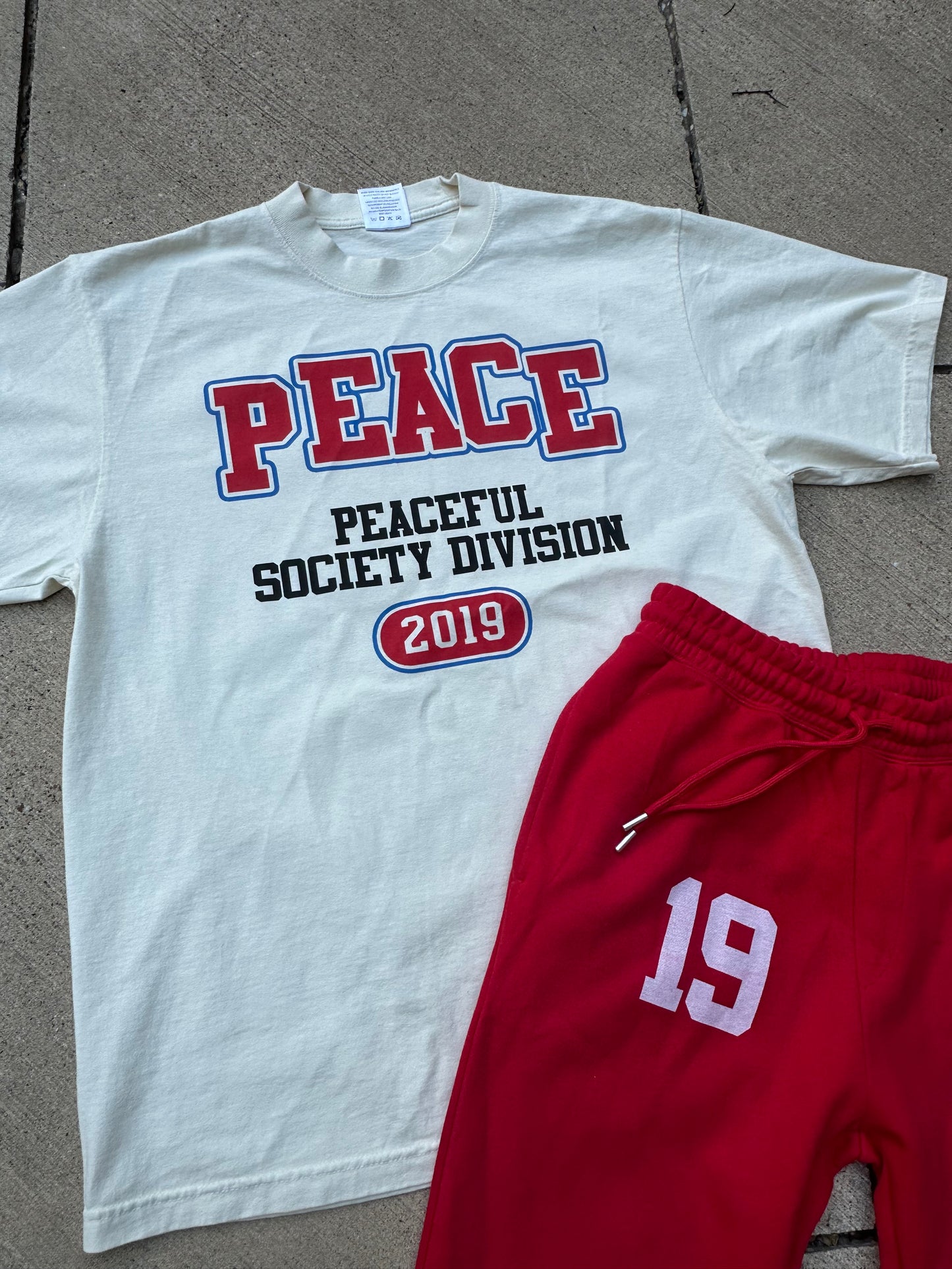 Cream ‘Peaceful Division’ T Shirt